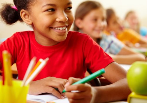 close-up-cheerful-student-with-red-t-shirt