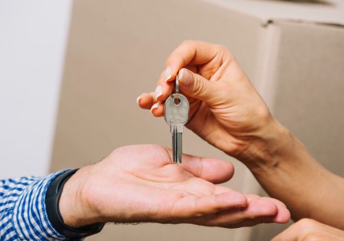 crop-people-exchanging-with-keys